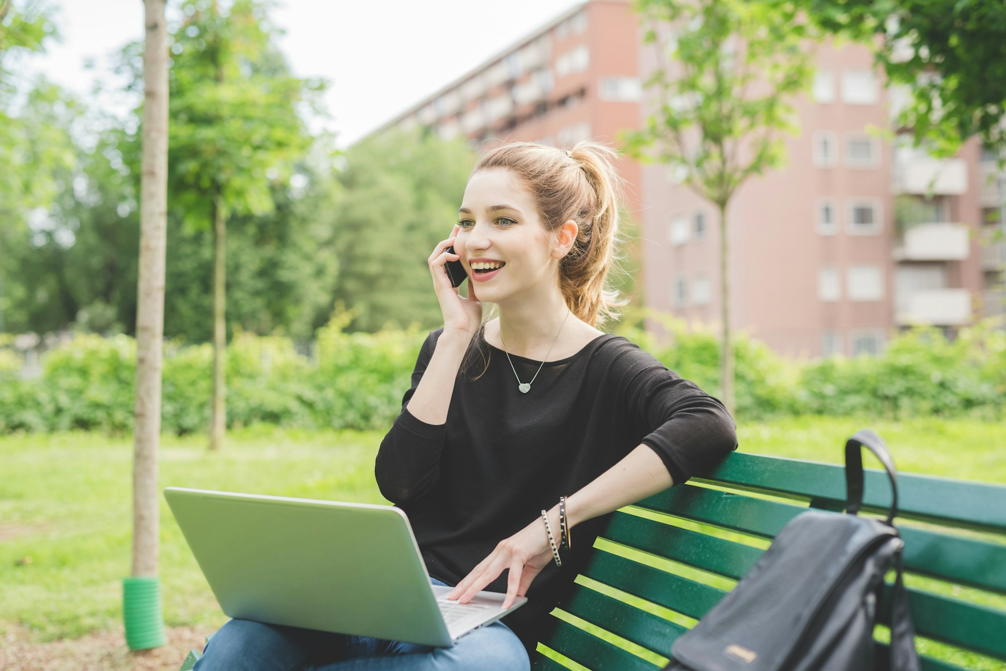 Young woman using computer remote working
